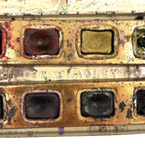 No. A1: Early Milton Bradley Watercolor Tin with Excellent Graphics, Blotter Papers, and Well Used Colors, c. 1890