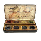 No. A1: Early Milton Bradley Watercolor Tin with Excellent Graphics, Blotter Papers, and Well Used Colors, c. 1890