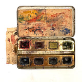 No. A1: Early Milton Bradley Watercolor Tin with Excellent Graphics, Blotter Papers, and Well Used Colors, c. 1890
