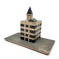 Super Graphic Folk Art Building with Clock Tower on Platform with Alligator Paint