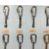 Vintage Salesman Sample Keychains Display on Sky Blue Board