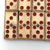 Wonderful Complete Set of Thick 19th Century Handmade Bone Dominoes with Red Pips and Brass Spinners
