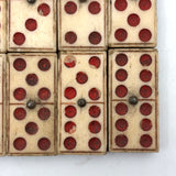 Wonderful Complete Set of Thick 19th Century Handmade Bone Dominoes with Red Pips and Brass Spinners