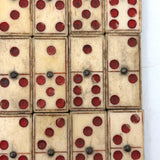 Wonderful Complete Set of Thick 19th Century Handmade Bone Dominoes with Red Pips and Brass Spinners