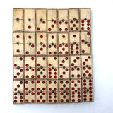 Wonderful Complete Set of Thick 19th Century Handmade Bone Dominoes with Red Pips and Brass Spinners