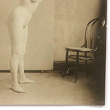 Poignant Old Photo of Nude Studio Model in Curious Pose