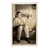 Dreamy Young Man in Pajamas with Airplanes