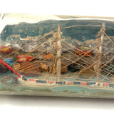 Early 20th Century Folk Art Ship in Mohan Meakin Bottle with Bridge, Houses and (Real) Rocky Shore