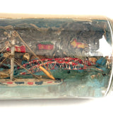 Early 20th Century Folk Art Ship in Mohan Meakin Bottle with Bridge, Houses and (Real) Rocky Shore