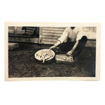 Headless Man with Fish and Cat, Old Snapshot