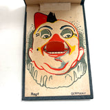 1920s German "Toilettez" Flip Open Surprise Clown with Mechanical Tongue