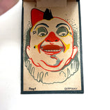 1920s German "Toilettez" Flip Open Surprise Clown with Mechanical Tongue