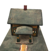 Orange and Green Painted Folk Art House on Platform