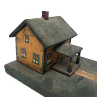 Orange and Green Painted Folk Art House on Platform