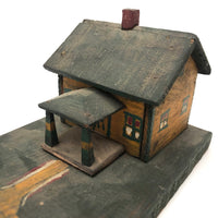 Orange and Green Painted Folk Art House on Platform
