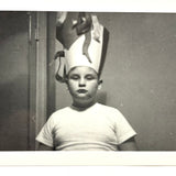 Boy in Homemade Party Hat with Attitude, Poignant Vintage Snapshot Portrait