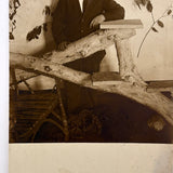 Installation, Illumination: Portrait of a Man in Constructed Environment with Incredibly Lit Face, Early 1900s RPPC