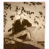 Installation, Illumination: Portrait of a Man in Constructed Environment with Incredibly Lit Face, Early 1900s RPPC