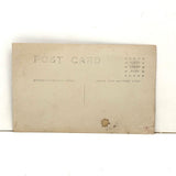 Installation, Illumination: Portrait of a Man in Constructed Environment with Incredibly Lit Face, Early 1900s RPPC