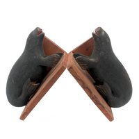 Inuit Carved Wood Sea Lion Bookends with Bared Teeth, a Pair