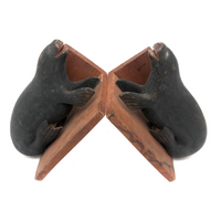 Inuit Carved Wood Sea Lion Bookends with Bared Teeth, a Pair