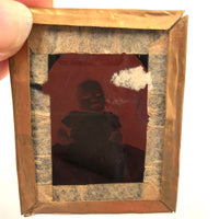 Strange Inner Glow: Evocatively Degraded  Ninth Plate Ruby Ambrotype of Baby