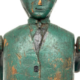 Curious c. Early 20th Century Carved Folk Art Man in Green and Black with Swinging Arms and Custom Base