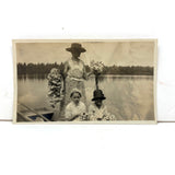 Woman and Children on Rowboat Holding Waterlilies, Poetic Antique Snapshot Photo