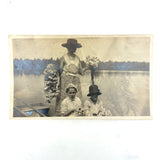 Woman and Children on Rowboat Holding Waterlilies, Poetic Antique Snapshot Photo