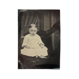 Young Child with Mother's Arm and Patterned Drape, Antique Tintype