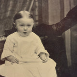 Young Child with Mother's Arm and Patterned Drape, Antique Tintype