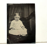 Young Child with Mother's Arm and Patterned Drape, Antique Tintype