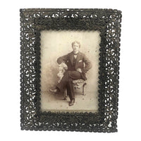 Young Man in Folk Art Chair, Antique Cabinet Card in Period Repousse Easel Frame