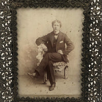 Young Man in Folk Art Chair, Antique Cabinet Card in Period Repousse Easel Frame