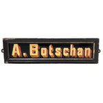 A Botschan Reverse Painted Glass Name Plate with Gold Foil Letters