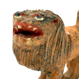 Carved Orange Folk Art Lion with Bared Teeth