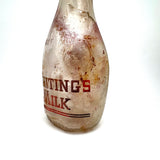 Quality For Over A Century, Painterly and Evocative Old Fire Tossed Glass Milk Bottle