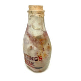 Quality For Over A Century, Painterly and Evocative Old Fire Tossed Glass Milk Bottle