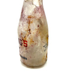 Quality For Over A Century, Painterly and Evocative Old Fire Tossed Glass Milk Bottle