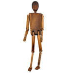 Unusual Older Inuit Carved Articulated Figure with Sad Face and Sinew Joints