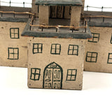 Both Humble and Grand Old Three Tiered Cigar Box Building with Nail and String Terrace Rail