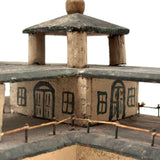 Both Humble and Grand Old Three Tiered Cigar Box Building with Nail and String Terrace Rail