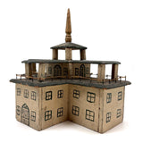 Both Humble and Grand Old Three Tiered Cigar Box Building with Nail and String Terrace Rail