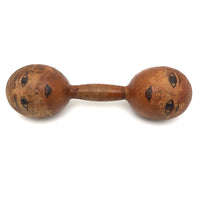 Old Wooden Barbell with Hand-drawn Faces