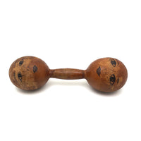 Old Wooden Barbell with Hand-drawn Faces