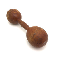 Old Wooden Barbell with Hand-drawn Faces