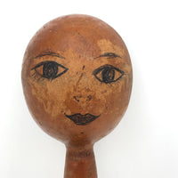 Old Wooden Barbell with Hand-drawn Faces