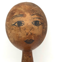 Old Wooden Barbell with Hand-drawn Faces