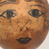 Old Wooden Barbell with Hand-drawn Faces