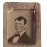 Curious Hand-tinted Tintype of Photograph of Young Man Pinned to Wall